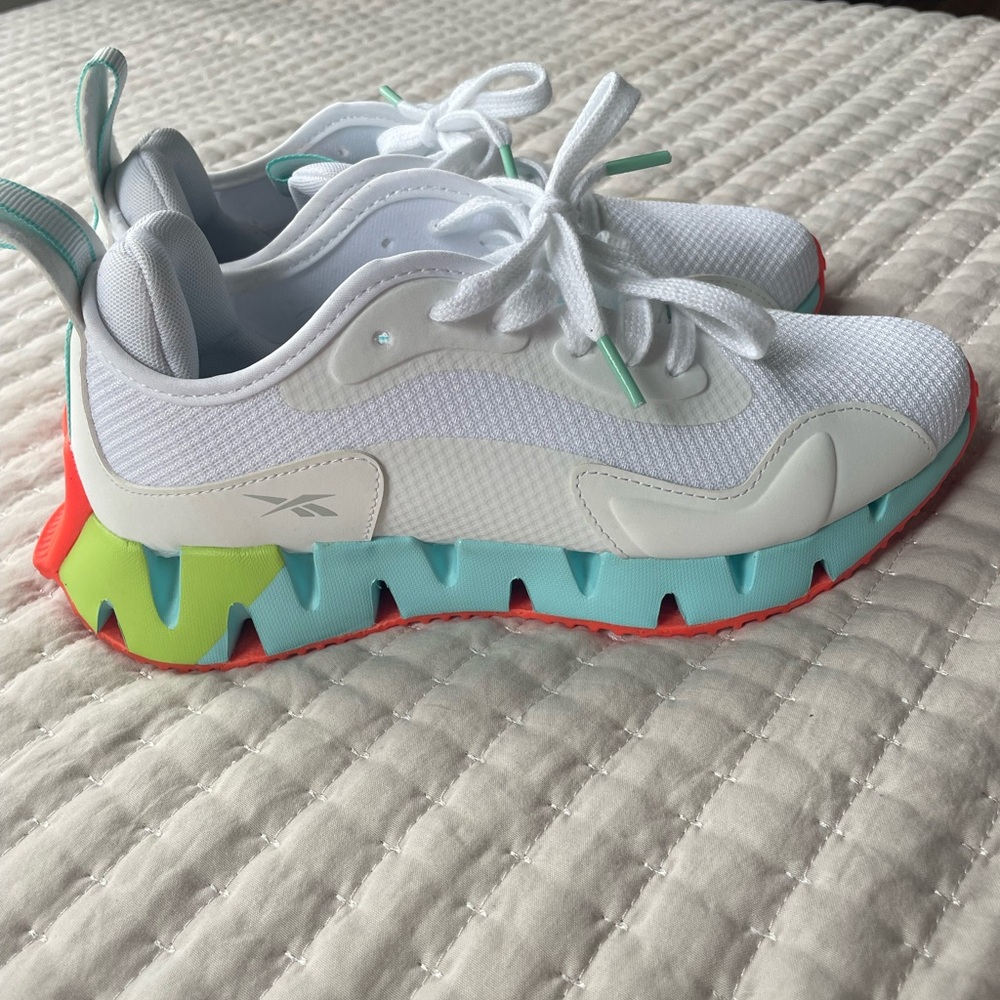 Reebok White and Blue Sneakers with Modern Design
